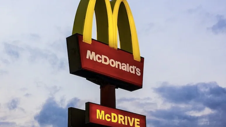 Dzens have fallen sick after an E. coli outbreak linked to McDonald's Quarter Pounder hamburger